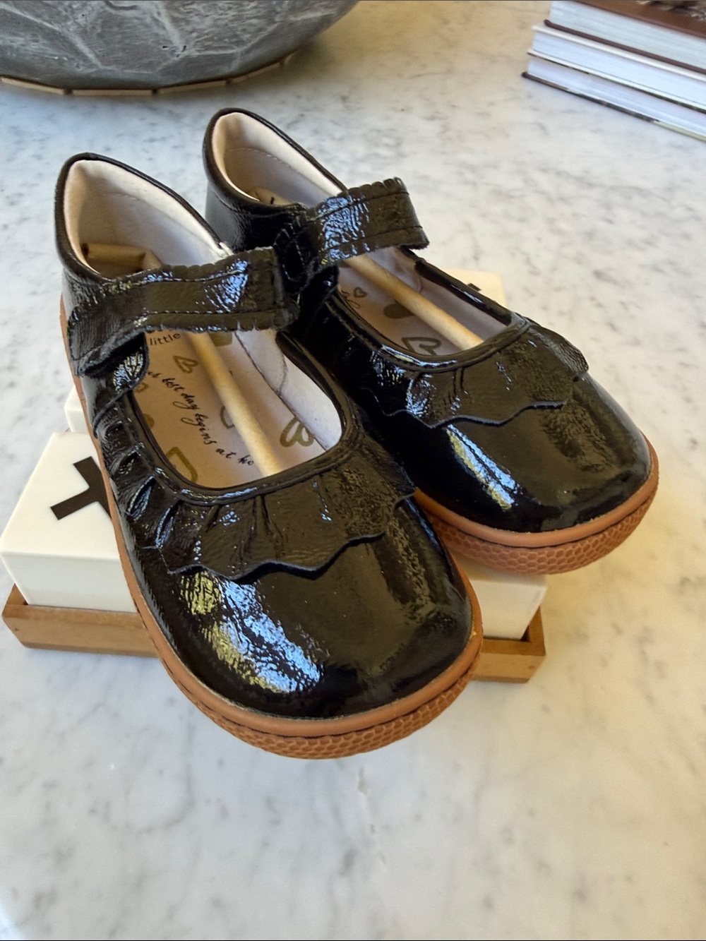 Livie & Luca Black Patent Mary Janes with Tan Sole